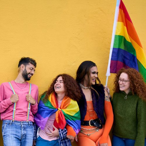 imgi_52_group-of-diverse-lgbt-young-people-leaning-on-wall-2024-04-26-16-26-23-utc-1-scaled